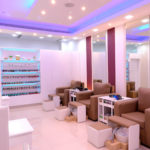 Photo of 4 of the workstations inside the Lavish Salon